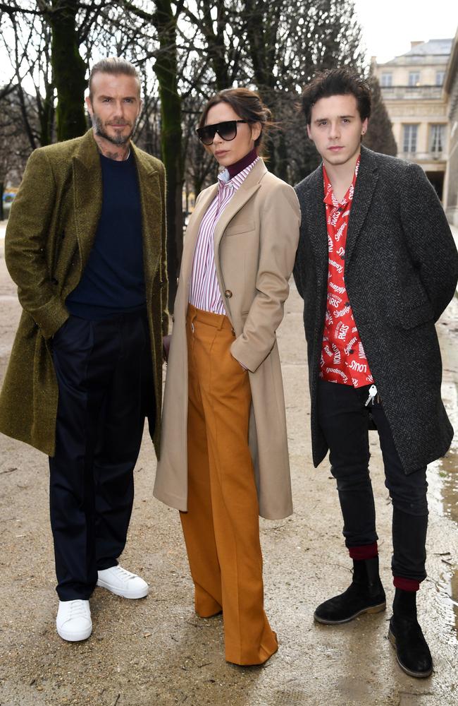 David Beckham, Victoria Beckham and Brooklyn Beckham attend the Louis Vuitton Menswear Fall/Winter 2018-2019 show as part of Paris Fashion Week. Picture: Pascal Le Segretain