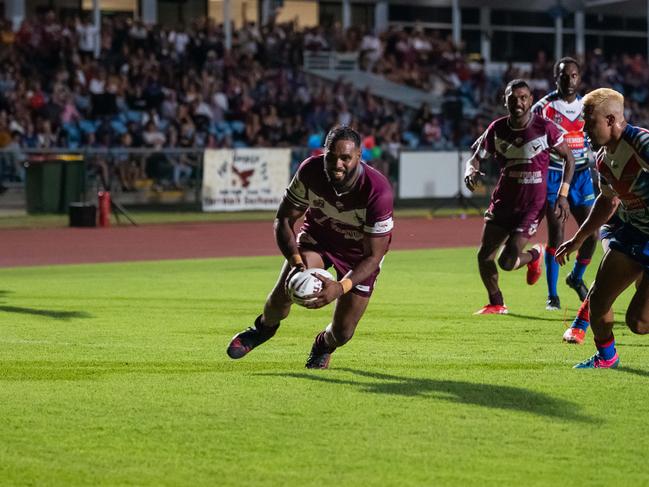 Yarrabah's Dale Ambrym crosses for a try. Picture: Emily Barker