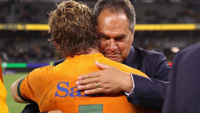 Michael Hooper and coach Dave Rennie celebrate after beating England in Perth in May.