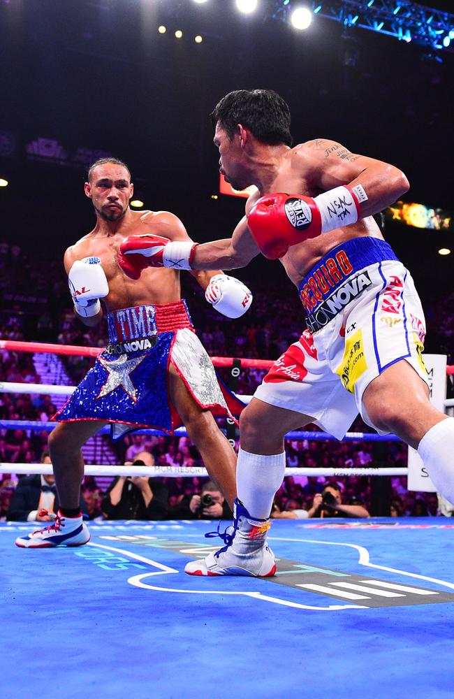 Pacquiao (R) fighting Thurman at MGM Grand Garden Arena in 2019. Picture: Kohjiro Kinno /Sports Illustrated/Getty Images