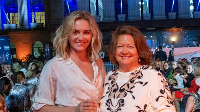 Gina Rinehart, right, with swimming champion Ariarne Titmus. Mrs Rinehart has received an Officer of the Order of Australia award.