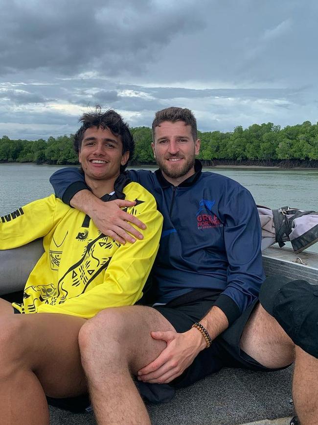 Western Bulldogs players Jamarra Ugle-Hagan and skipper Marcus Bontempelli pictured on a treasured fishing trip.