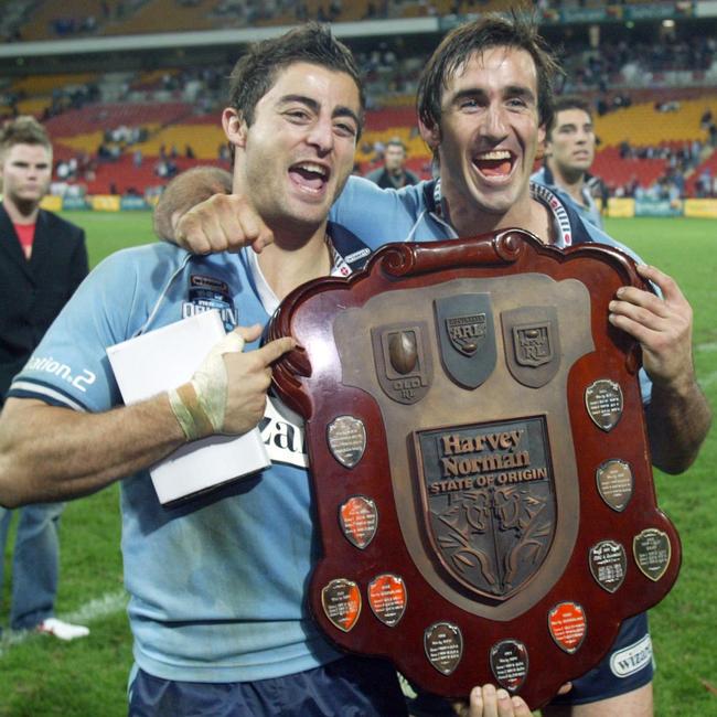 Anthony Minichiello and Andrew Johns after the deciding game three of the 2005 State of Origin series. Picture: AAP Image/Action Photographics/Charles Knight