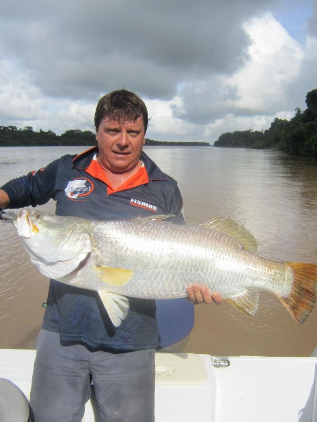 Chris Woolley with a 110cm barramundi from the Daly River. Picture: Supplied (Craig’s Fishing Warehouse)