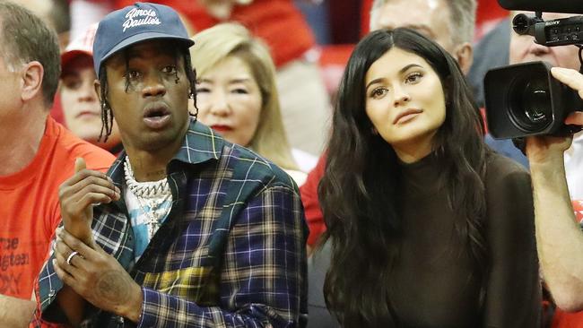 Kylie Jenner & Boyfriend Travis Scott Attend Louis Vuitton Fashion