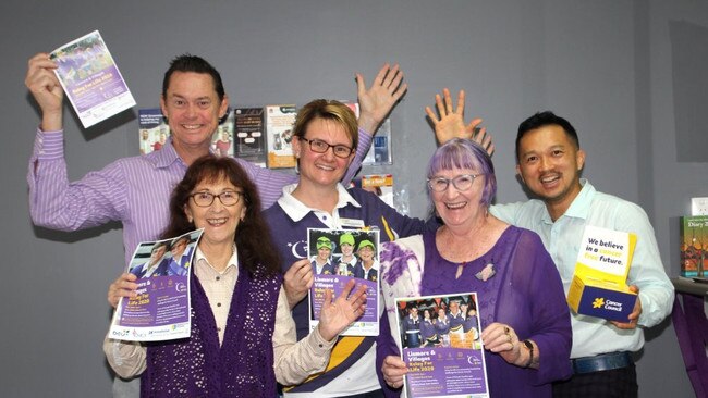 GET PURPLE: From left: John Dawson, Janelle Saffin MP, Leanne Thompson, Carmel Cook and Ronny Susanto. Photo: Marie Cook