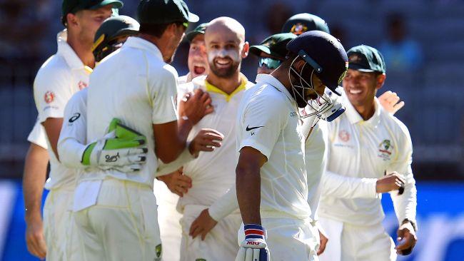 Virat Kohli is sent on his way by Nathan Lyon. Picture: William West