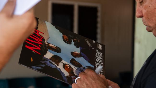 DJ Yella signs autographs for fans on Thursday. Picture: Pema Tamang Pakhrin