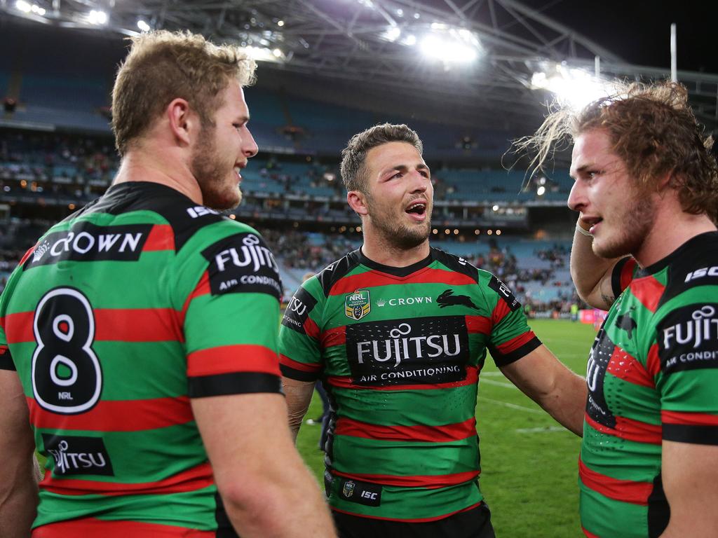 Sam Burgess with his brothers Tom (8) and George after South Sydney defeated St George Illawarra during the 2018 finals. Picture: Brett Costello