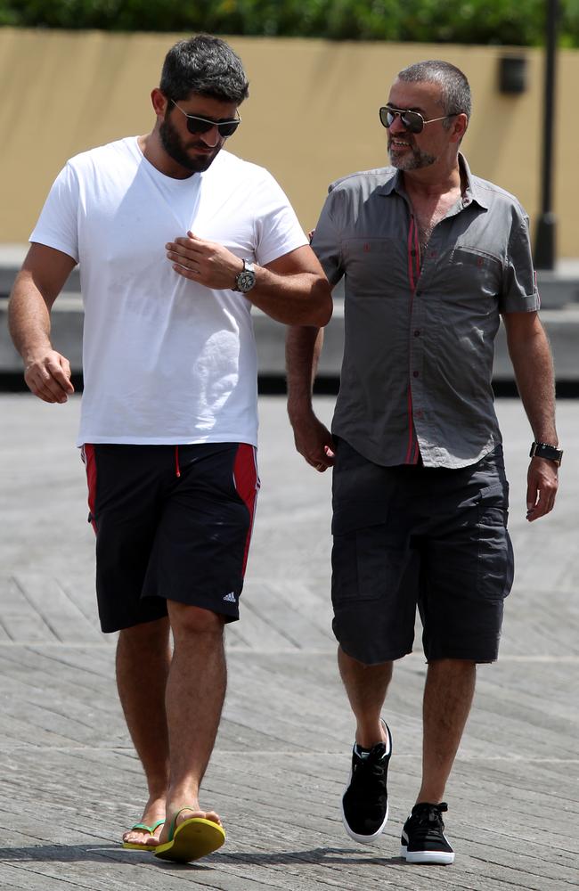 George Michael with his boyfriend Fadi Fawaz in Woolloomooloo, Sydney. Picture: Supplied