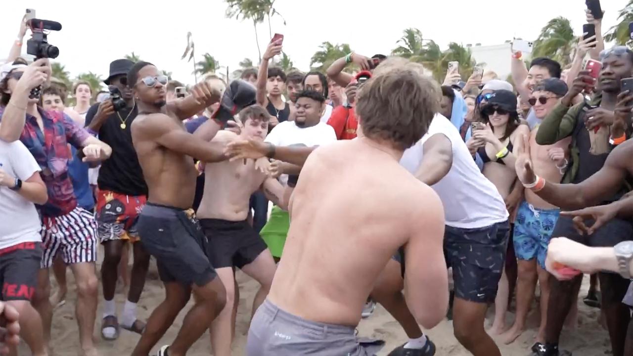Groups of young men were also seen hitting each other on the Fort Lauderdale shoreline. Picture: Romain Maurice/MEGA