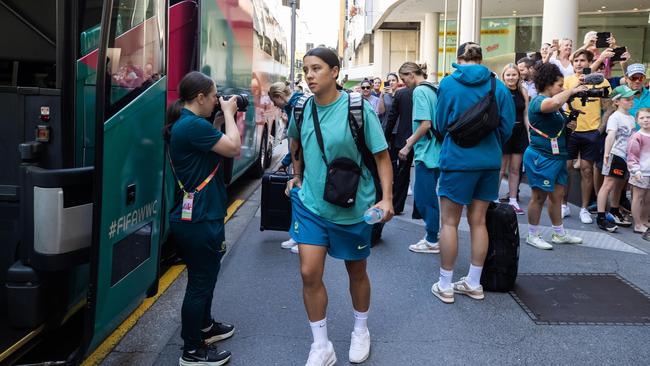 Sam Kerr boards the bus to leave the Hilton Hotel in Brisbane on Sunday morning after the Matildas history making quarterfinal win over France. Picture: Lachie Millard