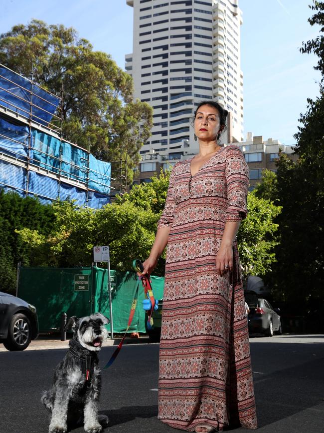 Jo Cooper with her dog Angus outside The Horizon apartment building in Darlinghurst, Sydney. Picture: Jonathan Ng