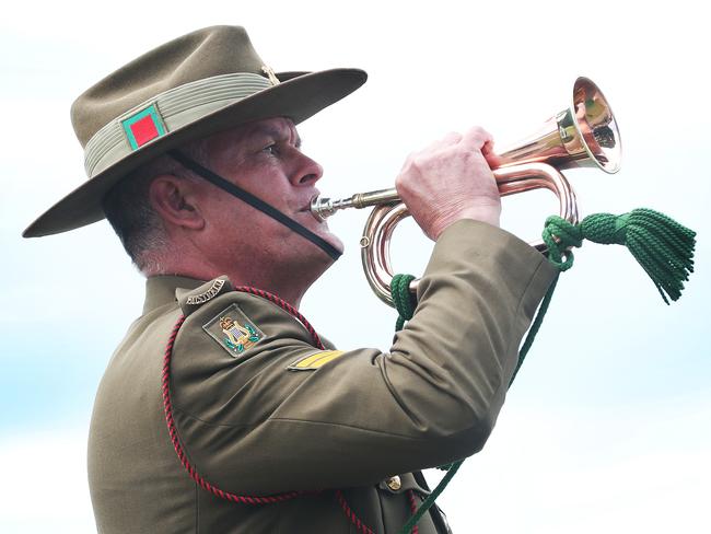 Ashley Thomson plays the bugle.  Remembrance Day 2019 ceremony at the cenotaph in Hobart.  Picture: NIKKI DAVIS-JONES