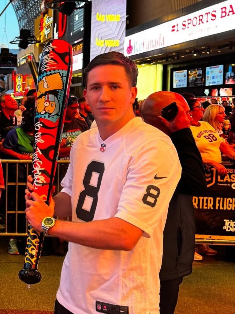 Cooper Johns with his Simpsons inflatable baseball bat in Downtown Las Vegas.