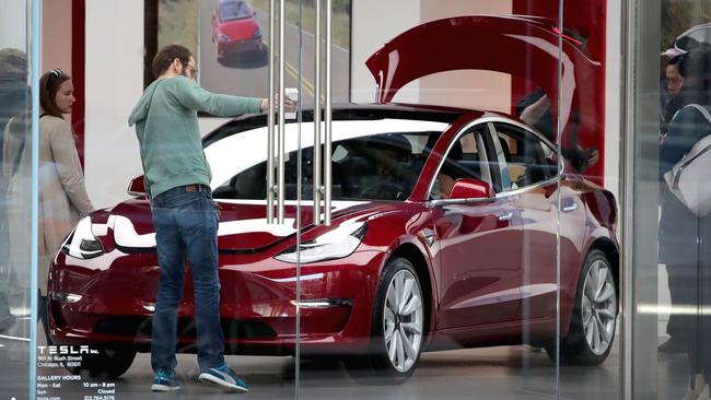A Model 3 in a showroom at a Tesla dealership in Chicago. Pic: AFP