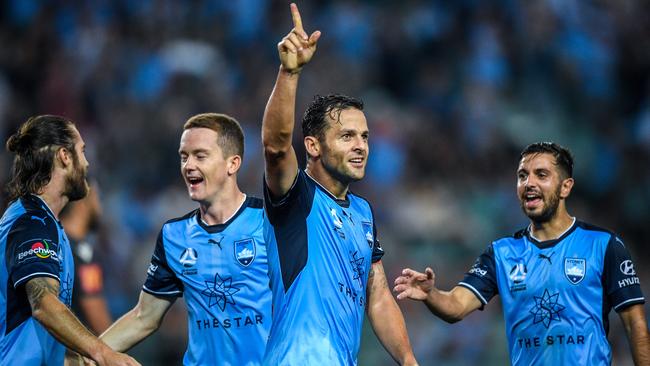 Deyvison Rogerio da Silva (Bobo) (centre) of Sydney reacts after scoring against Adelaide during the Round 26 A-League match between Sydney FC and Adelaide United. (AAP Image/Brendan Esposito)