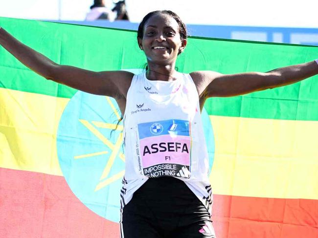 Assefa shaved more than two minutes from the previous best by Kosgei. Picture AFP/Getty Images