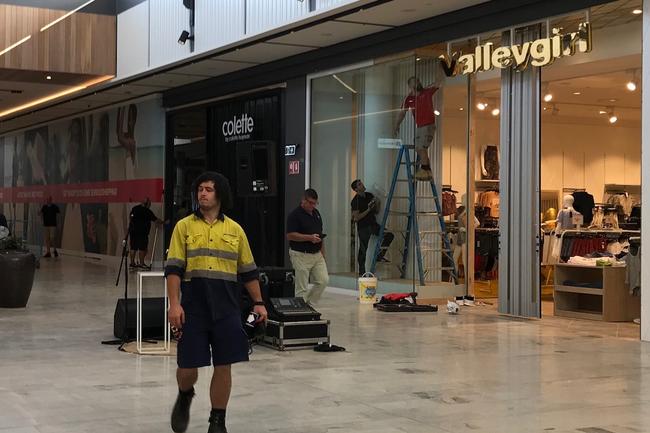 Workers putting the finishing touches on the Westfield Coomera at Coomera Town Centre