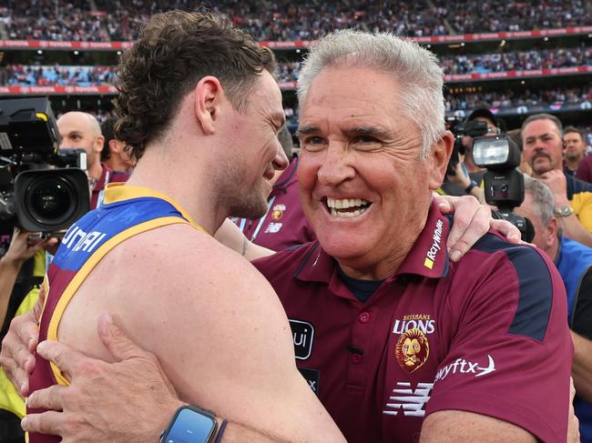 Lachie Neale embraces coach Chris Fagan. Picture: David Caird