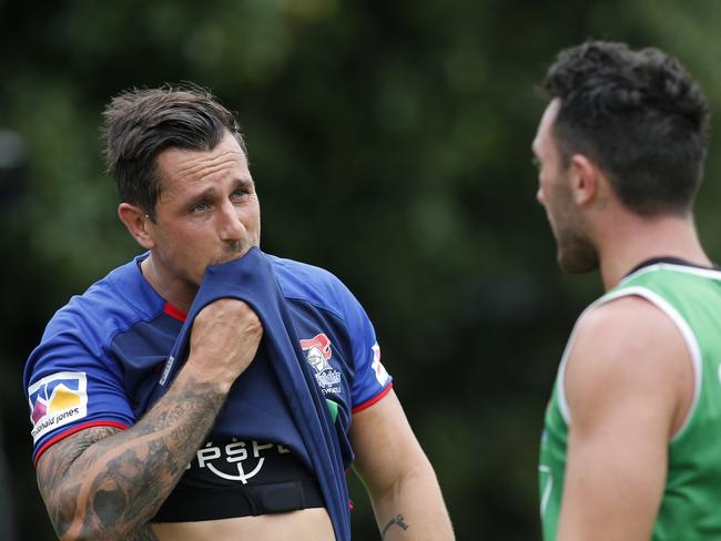 Star Newcastle Knights signing Mitchell Pearce chats with Brock Lamb as he  trains with his new squad at Balance field,Newcastle, on Monday, December 4, 2017. (AAP Image/Darren Pateman) NO ARCHIVING