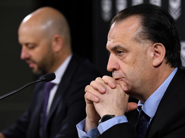 NRL CEO Todd Greenberg (left) and ARLC Chairman Peter V'landys speak to the media in Sydney, Sunday, March 15, 2020. (AAP Image/Joel Carrett) NO ARCHIVING