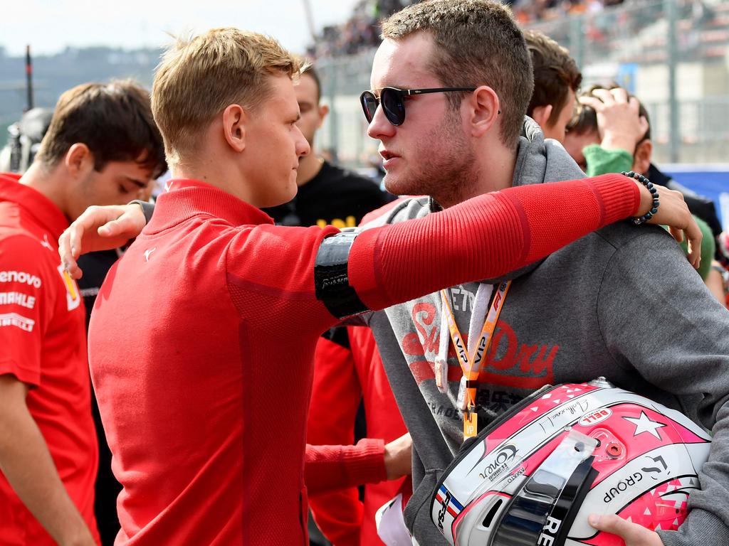 Mick Schumacher with the brother of French driver Anthoine Hubert.