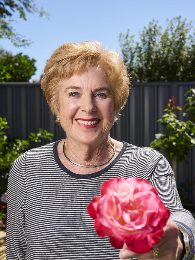 Sandy Mojsish with her roses at home in Royal Park, after winning best rose. Picture: Matt Loxton