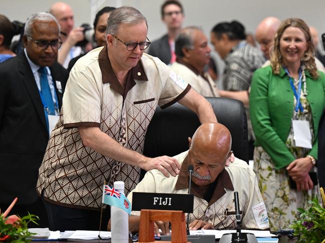 Australian Prime Minister Anthony Albanese greets the Prime Minister of Fiji Sitiveni Rabuka at the start of the plenary session at the 53rd Pacific Islands Forum Leaders Meeting in Nuku'alofa, Tonga, Wednesday, August 28, 2024. Leaders from Pacific Island nations are gathering in Tonga for the 53rd Pacific Islands Forum Leaders Meeting. (AAP Image/Lukas Coch) NO ARCHIVING