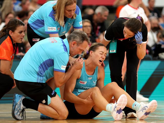 SYDNEY, AUSTRALIA - MARCH 24: Lauren Moore of the Mavericks receives treatment for an injury during the 2024 Suncorp Team Girls Cup match between the Giants and the Mavericks at Ken Rosewall Arena on March 24, 2024 in Sydney, Australia. (Photo by Mark Metcalfe/Getty Images for Netball Australia)