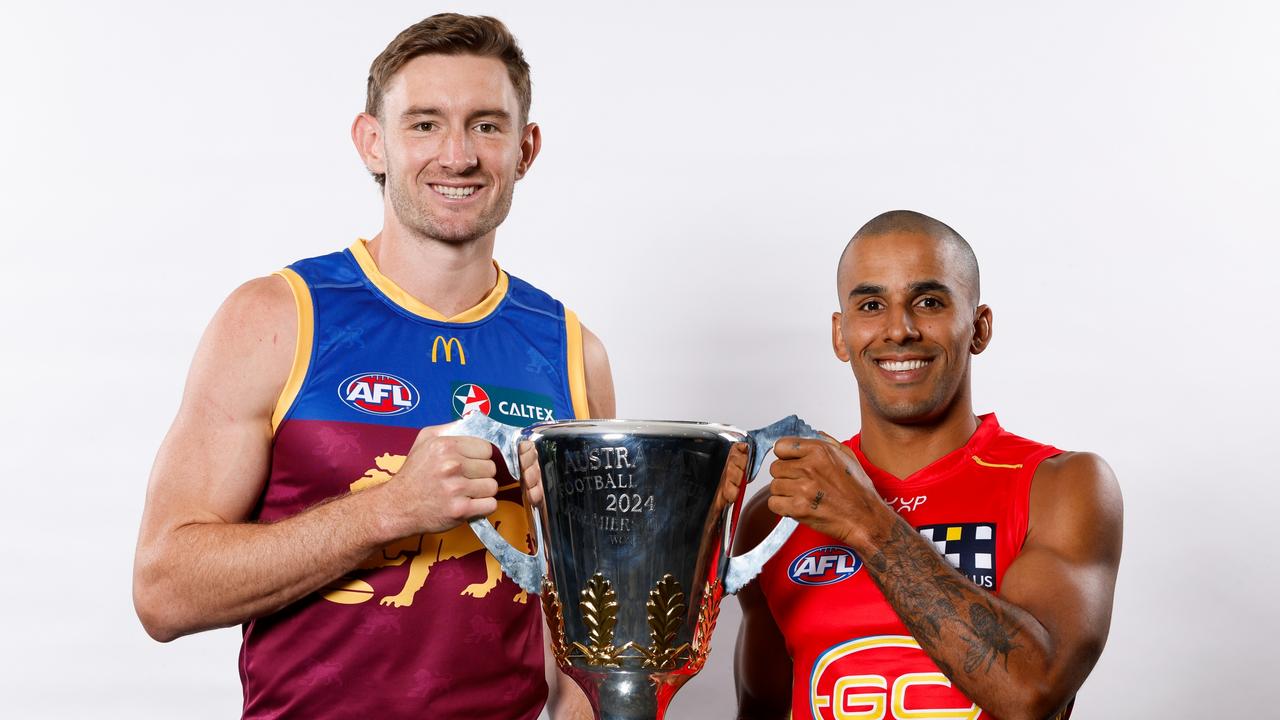 Touk Miller (right) says the friendship between coaches Damien Hardwick and Chris Fagan does not mean the heat will subside when Gold Coast and Brisbane meet this year. Picture: Dylan Burns / Getty Images