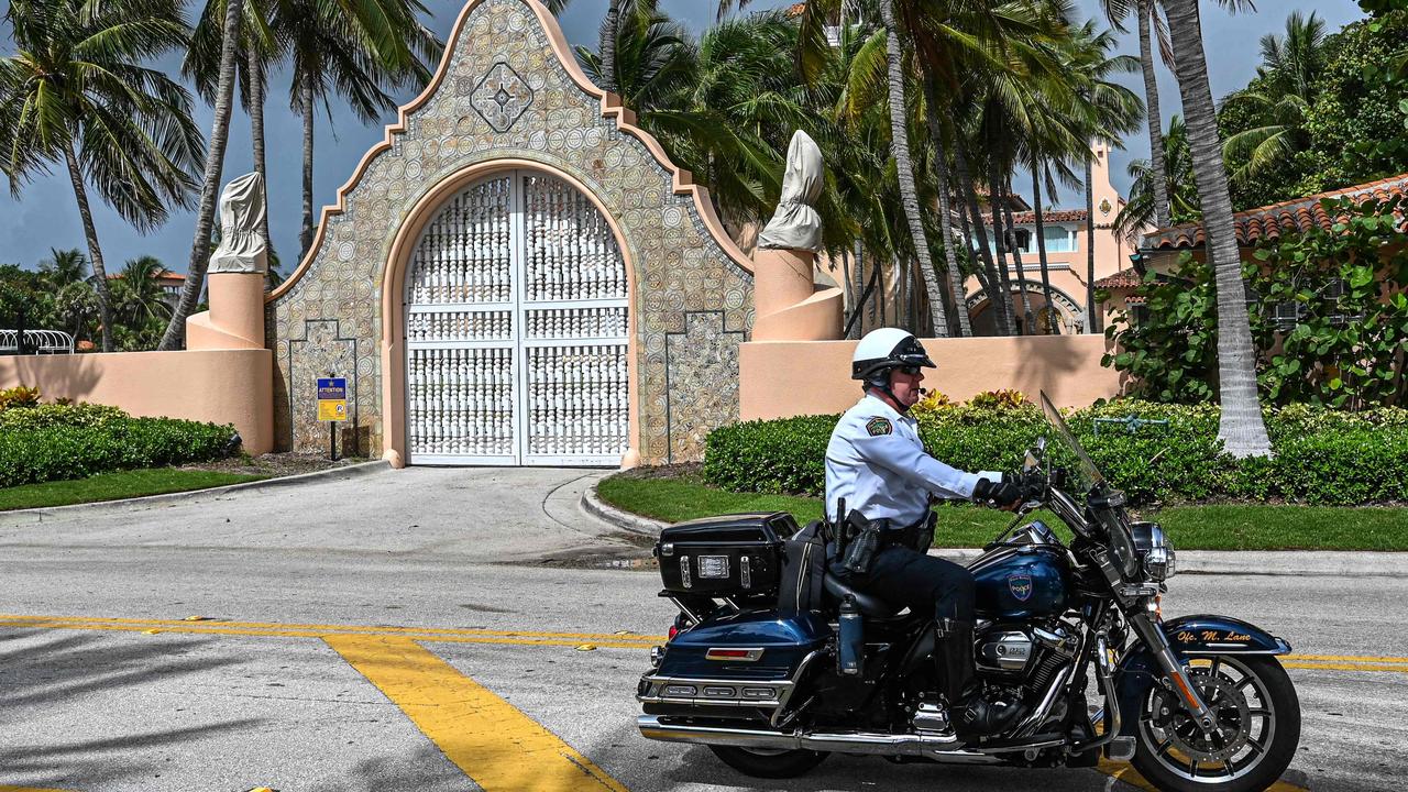 Local law enforcement officers outside Mar-a-Lago, which was raided by the FBI. Picture: AFP