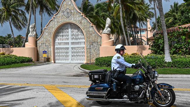 Local law enforcement officers outside Mar-a-Lago, which was raided by the FBI. Picture: AFP