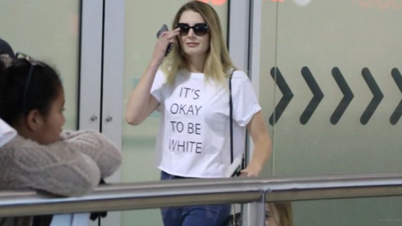 Right-wing activist Lauren Southern touches down in Brisbane ahead of her ‘free speech’ talks wearing an 'It's okay to be white' T-shirt. She said she received death threats because of it and will have heavy security at her shows to protect herself from ‘crazy protesters’. Picture: Twitter