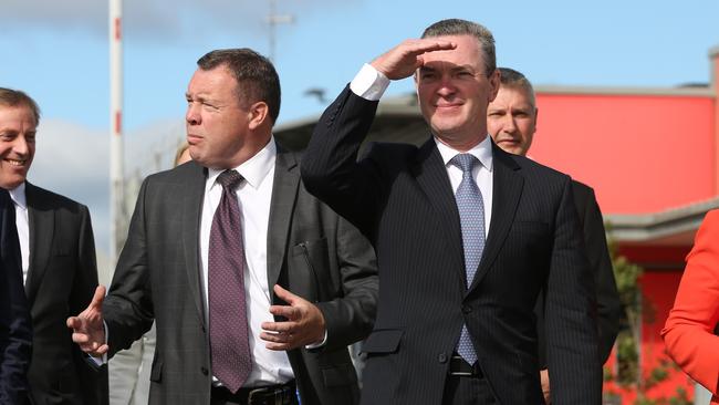 Mr Pyne with Graeme Hunter of Kellogg Brown &amp; Root. Picture: AAP