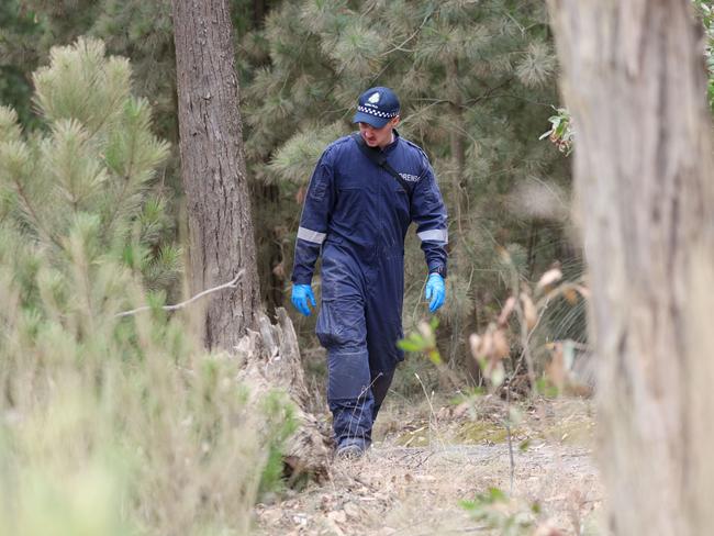 Police search in Woowookarung Regional Park. Picture: Brendan Beckett