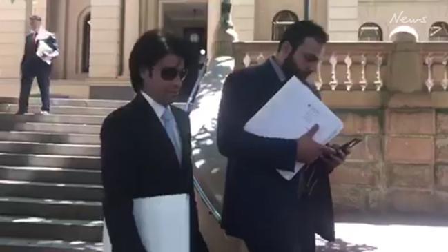 Fadi Ibrahim and Daniel Taylor leave court