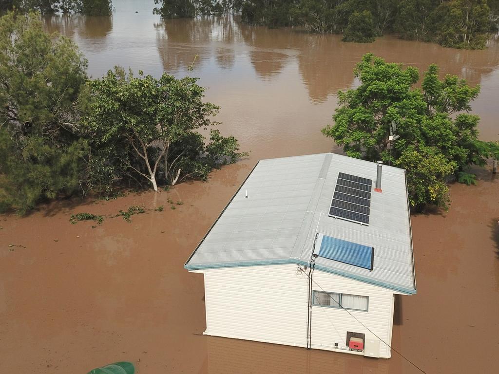 queensland-floods-second-person-confirmed-dead-as-search-continues-for