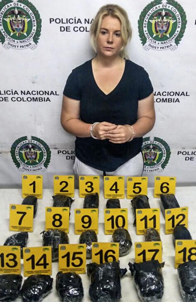 Ms Sainsbury with the cocaine she was allegedly caught with. Picture: AFP/Colombia Anti-Narcotics Police.