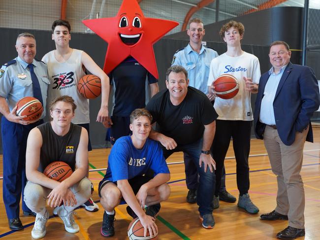 Gus Worland, the founder of Gotcha4Life (centre) with Chief Inspector Warren Hamilton, Operational Coordinator, Youth &amp; Crime Prevention Command (rear left) and PCYC NSW CEO, Dominic Teakle (rear right) at the Northern Beaches Police Citizens Youth Club at Dee Why with Senior Constable Mark Bursa (back row) and Lincoln MacKay, Max Steele, Josh Lloyd and Dylan Johnson. Picture: NSW PCYC