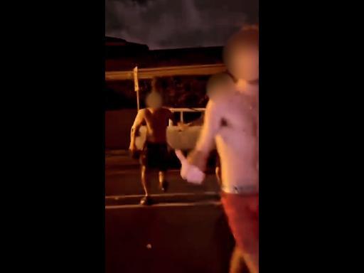 WATCH: Men fight shirtless on street after crash