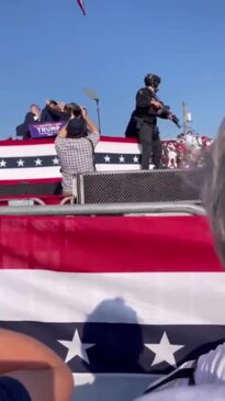 Cheers erupt as Trump stands, raises fist following Butler shooting