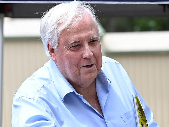 27/10/2020 : Clive Palmer during a press conference  with his candidate Steven Newbery , then handing out how to vote cards at a pre poll while on the hustings in the marginal electorate of Pumicestone,  north of Brisbane at Bribie Island for the upcoming QLD state election. Pic Lyndon Mechielsen