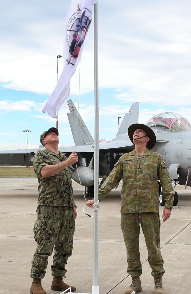 Captain Matthew Ort from the United States Navy alongside General Angus Campbell, Chief of the Defence Force break the Talisman Sabre flag during the Exercise Talisman Sabre opening ceremony from RAAF Base Amberley. Picture: Zak Simmonds