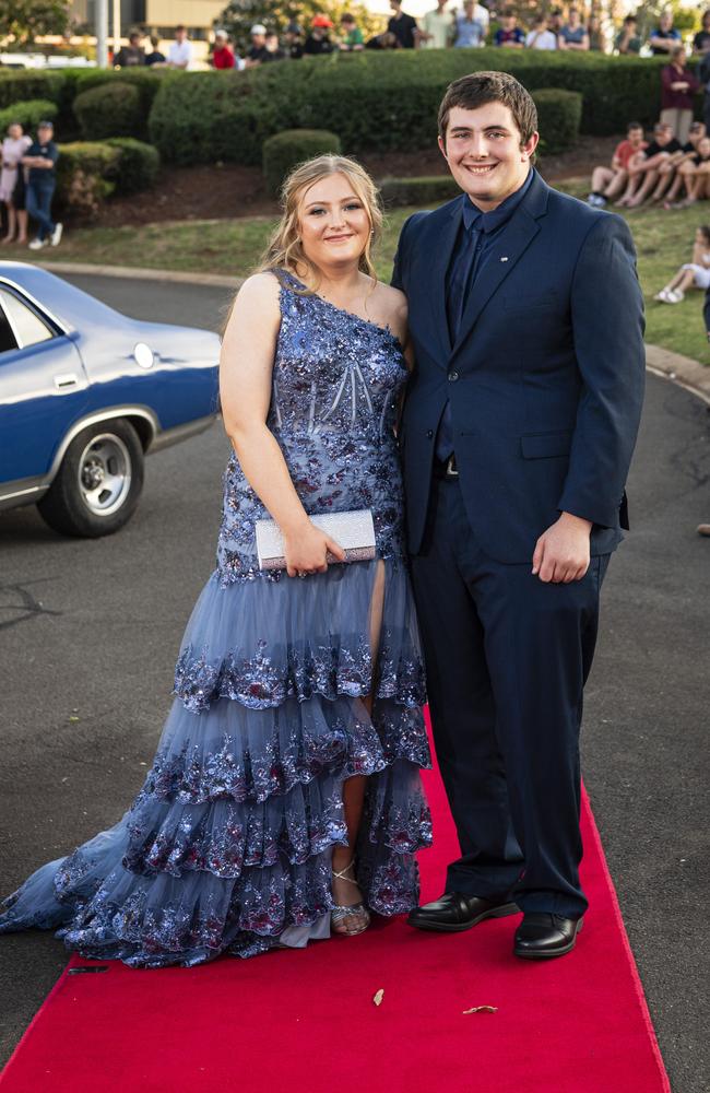 Graduates Kaylee Balderson and Thomas Fagan arrive at Mary MacKillop Catholic College formal at Highfields Cultural Centre, Thursday, November 14, 2024. Picture: Kevin Farmer