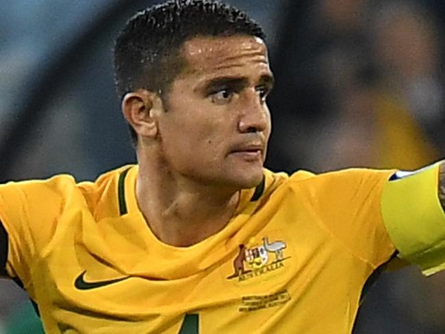 Tim Cahill of the Socceroos holds his hands in the air during the international friendly between Australia and Brazil at the MCG in Melbourne, Tuesday, June 13, 2017. (AAP Image/Julian Smith) NO ARCHIVING, EDITORIAL USE ONLY