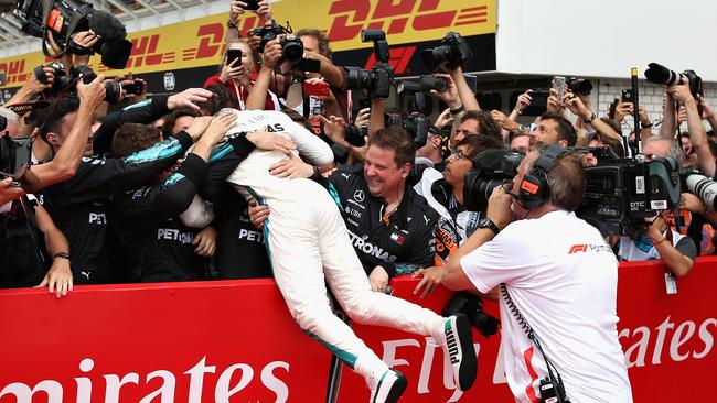 HOCKENHEIM, GERMANY - JULY 22: Race winner Lewis Hamilton of Great Britain and Mercedes GP celebrates in parc ferme during the Formula One Grand Prix of Germany at Hockenheimring on July 22, 2018 in Hockenheim, Germany. (Photo by Charles Coates/Getty Images) *** BESTPIX ***