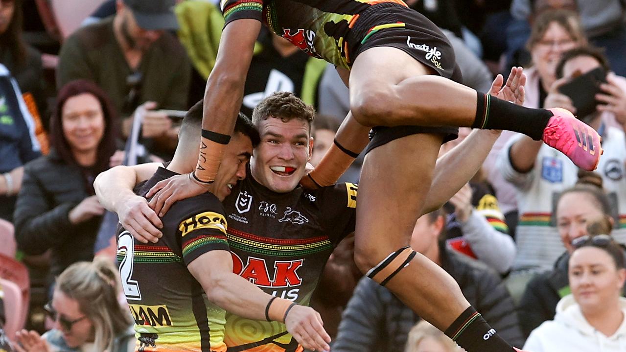 PENRITH, AUSTRALIA - MAY 29: Charlie Staines of the Panthers celebrates scoring a try with team mates during the round 12 NRL match between the Penrith Panthers and the Canterbury Bulldogs at Panthers Stadium, on May 29, 2021, in Penrith, Australia. (Photo by Brendon Thorne/Getty Images)