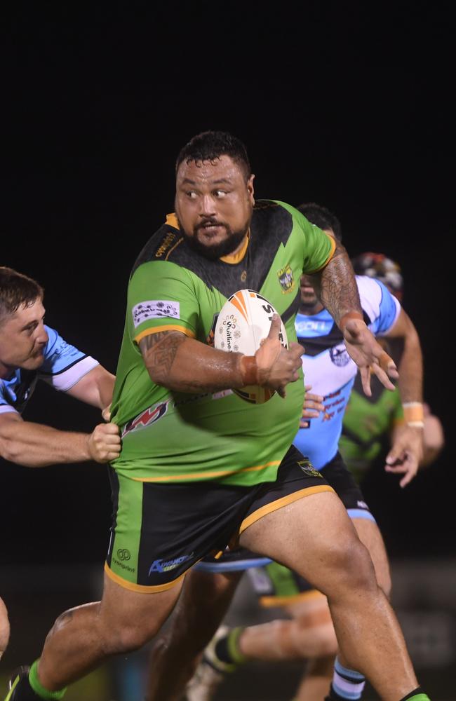 Palmerston Raiders Joel Turaga breaks through the Northern Sharks line in the NRLNT Grand Final 2022. Picture: (A)manda Parkinson