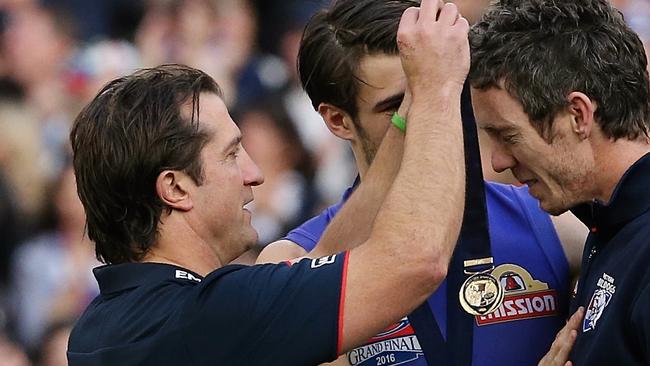 Luke Beveridge was universally loved after handing his premiership medal to Bob Murphy. Picture: Wayne Ludbey